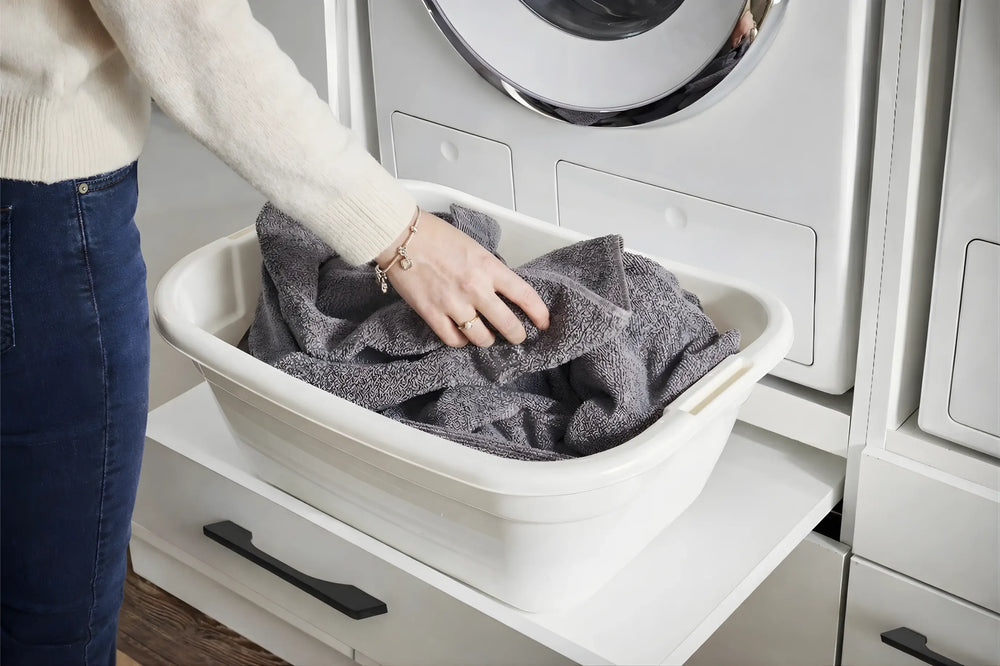 Wasdroom ergonomische lade met wasmand erop